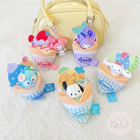A soft and kawaii plush crepe keychain with cute details and a mini figure inside. Perfect as a bag charm, keychain or small collectible.