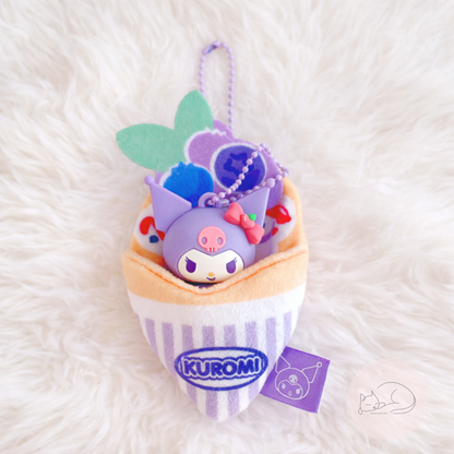 A soft and kawaii plush crepe keychain with cute details and a mini figure inside. Perfect as a bag charm, keychain or small collectible.